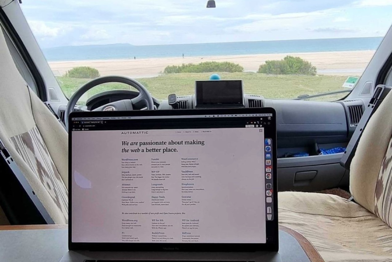 laptop in the car parked at the beach