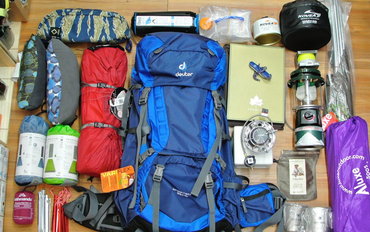 camping gear laid out on a table